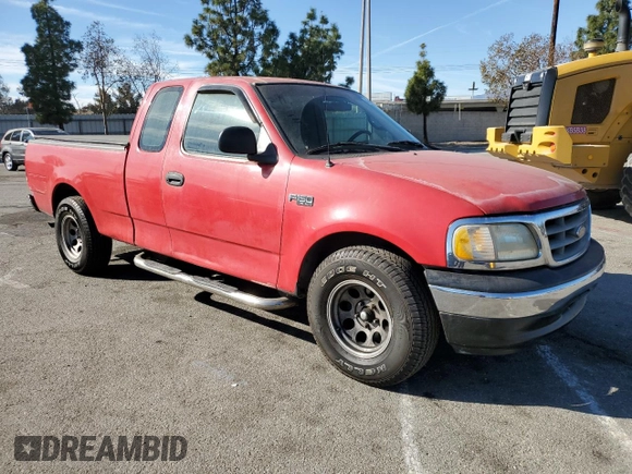 2000 Ford F-150 XL with VIN 1FTZX1721YNA67771, listed as a Copart auction lot 41439795 with 0 mi miles and Salvage Title. Bid and sale history available at carsss.com. Image 4.