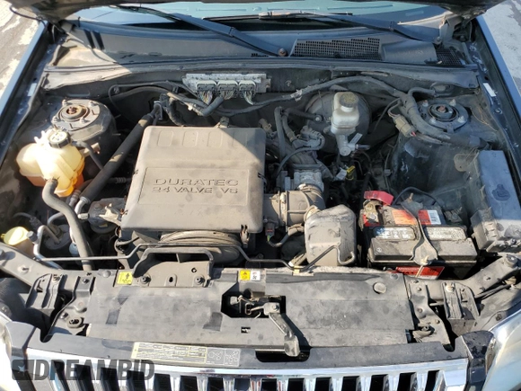 2009 Mercury Mariner Premier с VIN 4M2CU97G69KJ23595, выставлен на аукционе Copart как лот 59131405 с пробегом 153 196 миль миль и Списание • Salvage title. История ставок и продаж доступна на DreamBid. Изображение 12.