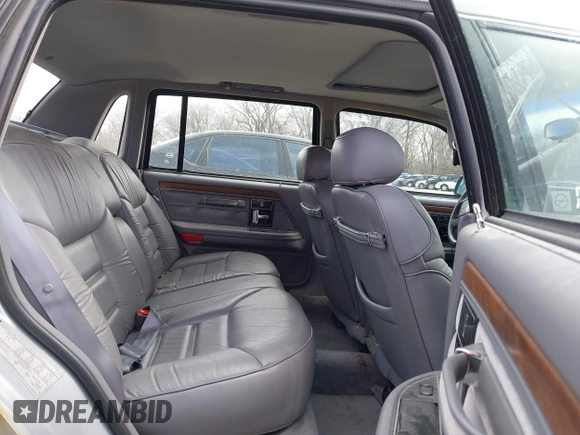 1994 Lincoln Continental with VIN 1LNLM9846RY605390, listed as a IAAI auction lot 41839116 with 100,151 mi miles and . Bid and sale history available at DreamBid. Image 8.