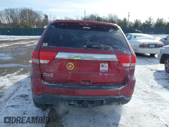 2013 Jeep Grand Cherokee Laredo with VIN 1C4RJFAG4DC572986, listed as a IAAI auction lot 41586820 with 100,899 mi miles. Bid and sale history available at carsss.com. Image 17.