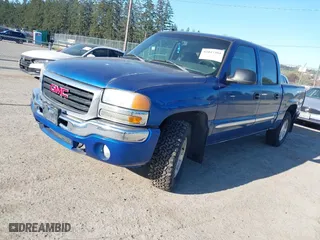2004 GMC Sierra 1500 Crew Cab SLE with VIN 2GTEK13TX41394077, listed as a IAAI auction lot 42047304 with 227,296 mi miles. Bid and sale history available at carsss.com. Image 17.