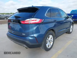 2019 Ford Edge SEL with VIN 2FMPK3J95KBC01252, listed as a IAAI auction lot 42004080 with 32,642 mi miles and . Bid and sale history available at DreamBid. Image 4.