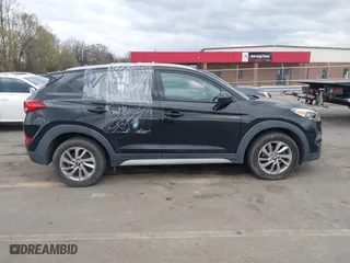 2017 Hyundai Tucson SE Plus with VIN KM8J33A49HU584557, listed as a IAAI auction lot 41853951 with 105,602 mi miles. Bid and sale history available at carsss.com. Image 13.
