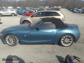 2004 BMW Z4 2.5i with VIN 4USBT33524LR67071, listed as a IAAI auction lot 41632627 with 106,084 mi miles. Bid and sale history available at carsss.com. Image 15.