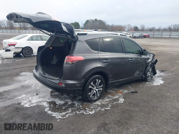 2016 Toyota RAV4 LE with VIN JTMZFREV5GJ093472, listed as a IAAI auction lot 41332037 with 212,869 mi miles. Bid and sale history available at carsss.com. Image 4.