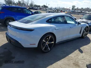 2021 Porsche Taycan 4S z VIN WP0AB2Y12MSA43873, wystawiony jako IAAI lot #41703233 z przebiegiem 24 452 mil mil oraz . Historia ofert i sprzedaży dostępna na DreamBid. Obrazek 4.