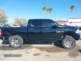 2015 Ram 1500 Express z VIN 1C6RR6KT1FS517948, wystawiony jako IAAI lot #41355978 z przebiegiem 94 784 mil mil oraz . Historia ofert i sprzedaży dostępna na DreamBid. Obrazek 13.