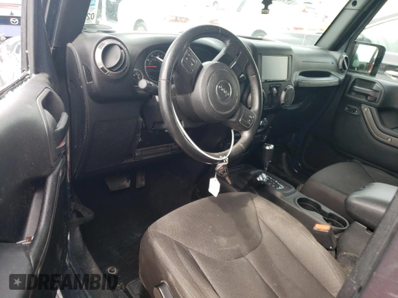 2017 Jeep Wrangler Sport with VIN 1C4AJWAGXHL540496, listed as a Copart auction lot 50692705 with 115,042 mi miles and Salvage Title. Bid and sale history available at DreamBid. Image 8.