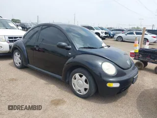 2001 Volkswagen Beetle GLS with VIN 3VWCP21C01M421287, listed as a IAAI auction lot 41916015 with 413,348 mi miles and . Bid and sale history available at DreamBid. Image 1.