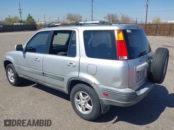 1999 Honda CR-V EX with VIN JHLRD1860XC056641, listed as a IAAI auction lot 42018329 with 321,707 mi miles. Bid and sale history available at carsss.com. Image 3.