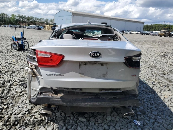 2014 Kia Optima LX z VIN 5XXGM4A79EG311308, wystawiony jako Copart lot #58212405 z przebiegiem 147 006 mil mil oraz Szkoda całkowita • Salvage title. Historia ofert i sprzedaży dostępna na DreamBid. Obrazek 6.