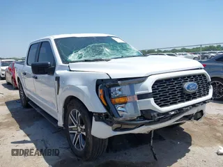 2023 Ford F-150 XL with VIN 1FTEW1CP5PKF42521, listed as a IAAI auction lot 42257062 with 30,758 mi miles and . Bid and sale history available at DreamBid. Image 1.