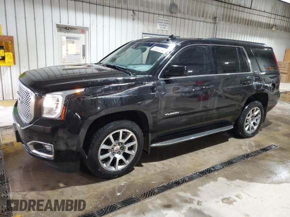 2015 GMC Yukon SLE with VIN 1GKS2AKC3FR664740, listed as a Copart auction lot 53824145 with 194,655 mi miles and Salvage Title. Bid and sale history available at carsss.com. Image 1.