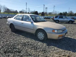 1996 Toyota Camry DX with VIN JT2BG12K1T0395294, listed as a Copart auction lot 47295405 with 259,898 mi miles and Salvage Title. Bid and sale history available at carsss.com. Image 4.