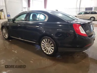 2014 Lincoln MKS with VIN 1LNHL9DK3EG611354, listed as a Copart auction lot 49008525 with 114,232 mi miles and Salvage Title. Bid and sale history available at carsss.com. Image 2.