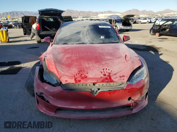 2021 Tesla Model S Plaid z VIN 5YJSA1E65MF435922, wystawiony jako Copart lot #77417854 z przebiegiem Nie podano mil oraz Szkoda całkowita • Salvage title. Historia ofert i sprzedaży dostępna na DreamBid. Obrazek 5.