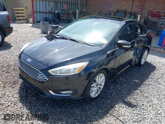 2016 Ford Focus Titanium z VIN 1FADP3J28GL393422, wystawiony jako IAAI lot #42075513 z przebiegiem 146 535 mil mil oraz . Historia ofert i sprzedaży dostępna na DreamBid. Obrazek 17.