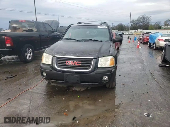 2004 GMC Envoy SLT with VIN 1GKDT13S042310076, listed as a Copart auction lot 79965854 with 220,506 mi miles and Salvage Title. Bid and sale history available at carsss.com. Image 11.