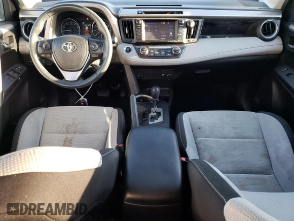2017 Toyota RAV4 XLE with VIN 2T3WFREV9HW347299, listed as a Copart auction lot 62237864 with 103,392 mi miles and Salvage Title. Bid and sale history available at DreamBid. Image 8.