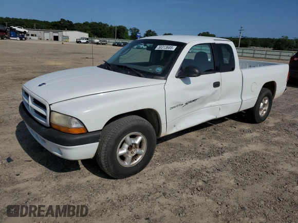 2001 Dodge Dakota z VIN 1B7GL22X21S128774, wystawiony jako Copart lot #58313685 z przebiegiem 167 355 mil mil oraz Czysty tytuł • Clean title. Historia ofert i sprzedaży dostępna na DreamBid. Obrazek 1.