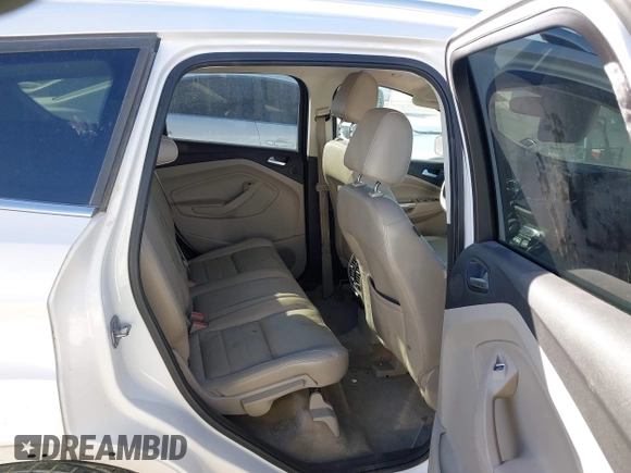2016 Ford Escape Titanium with VIN 1FMCU0J96GUB36680, listed as a IAAI auction lot 41446705 with 137,926 mi miles. Bid and sale history available at carsss.com. Image 8.