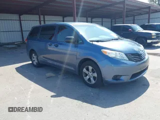 2014 Toyota Sienna L with VIN 5TDZK3DC2ES493997, listed as a IAAI auction lot 41996586 with 192,297 mi miles. Bid and sale history available at carsss.com. Image 1.
