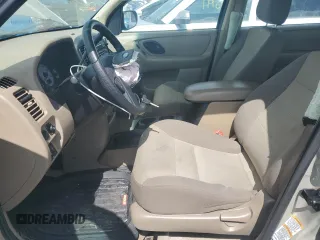2004 Ford Escape with VIN 1FMCU02184KB21677, listed as a Copart auction lot 58401445 with 102,508 mi miles and Salvage title. Bid and sale history available at DreamBid. Image 7.
