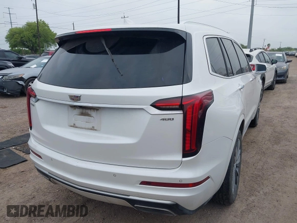 2020 Cadillac XT6 FWD Premium Luxury with VIN 1GYKPCRS2LZ101061, listed as a IAAI auction lot 42113360 with Not provided miles and . Bid and sale history available at DreamBid. Image 4.