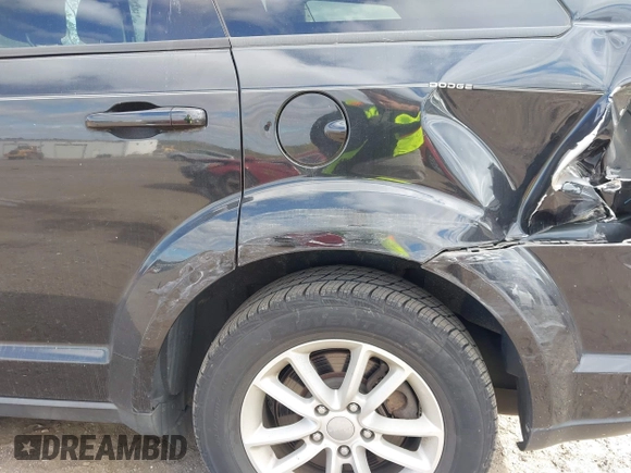 2013 Dodge Journey SXT with VIN 3C4PDDBG7DT553130, listed as a IAAI auction lot 40570369 with Not Provided miles and . Bid and sale history available at DreamBid. Image 12.