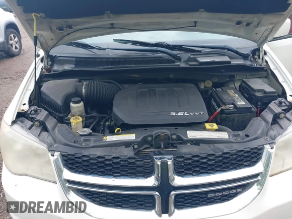 2012 Dodge Grand Caravan SXT with VIN 2C4RDGCG4CR145484, listed as a IAAI auction lot 42127663 with 278,872 mi miles and . Bid and sale history available at DreamBid. Image 10.