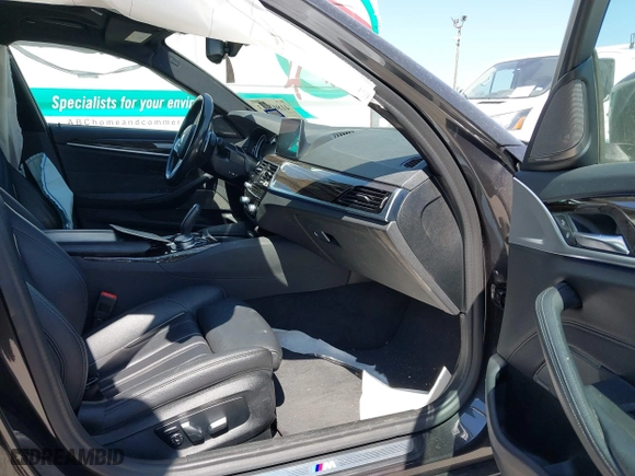 2019 BMW 5 Series 530i xDrive with VIN WBAJA7C50KG910479, listed as a IAAI auction lot 41802413 with 84,932 mi miles. Bid and sale history available at carsss.com. Image 5.