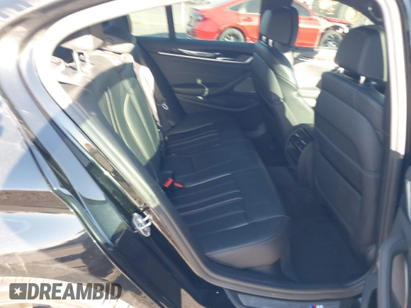2019 BMW 5 Series M550i xDrive with VIN WBAJB9C51KB288416, listed as a IAAI auction lot 41265378 with 52,529 mi miles and . Bid and sale history available at DreamBid. Image 8.