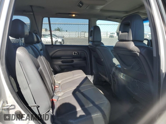 2005 Honda Pilot EX-L z VIN 2HKYF18635H569581, wystawiony jako Copart lot #57295595 z przebiegiem 209 697 mil mil oraz Szkoda całkowita • Salvage title. Historia ofert i sprzedaży dostępna na DreamBid. Obrazek 11.
