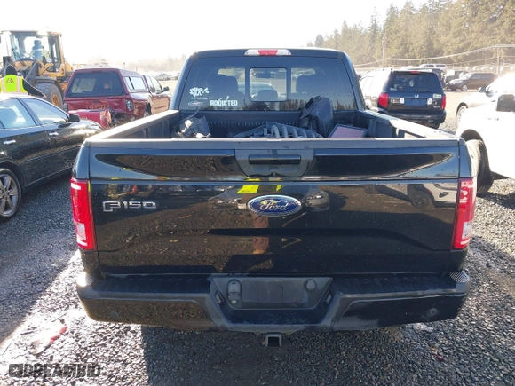 2015 Ford F-150 XLT w/HD Payload Pkg with VIN 1FTFW1EG5FFC13942, listed as a IAAI auction lot 41392709 with 196,416 mi miles. Bid and sale history available at carsss.com. Image 17.