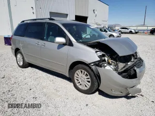 2010 Toyota Sienna XLE z VIN 5TDDK4CC8AS033268, wystawiony jako Copart lot #48503455 z przebiegiem 134 959 mil mil oraz Szkoda całkowita • Salvage title. Historia ofert i sprzedaży dostępna na DreamBid. Obrazek 4.