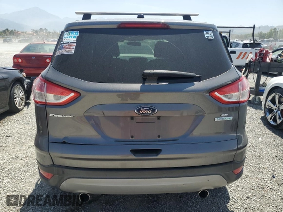 2013 Ford Escape SE с VIN 1FMCU0GX0DUA47561, выставлен на аукционе Copart как лот 58229785 с пробегом 177 339 миль миль и Чистый • Clean title. История ставок и продаж доступна на DreamBid. Изображение 6.