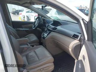 2011 Honda Odyssey EX-L with VIN 5FNRL5H60BB026171, listed as a IAAI auction lot 42511296 with 288,827 mi miles and . Bid and sale history available at DreamBid. Image 5.