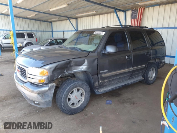 2001 GMC Yukon SLT z VIN 1GKEK13T21J165558, wystawiony jako Copart lot #52200565 z przebiegiem 291 699 mil mil oraz Szkoda całkowita • Salvage title. Historia ofert i sprzedaży dostępna na DreamBid. Obrazek 1.