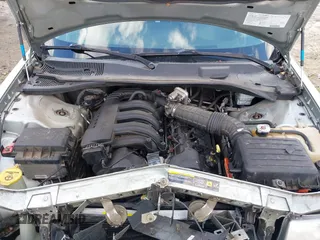 2005 Chrysler 300 with VIN 2C3JA43R05H137403, listed as a IAAI auction lot 41399519 with 135,044 mi miles. Bid and sale history available at carsss.com. Image 10.