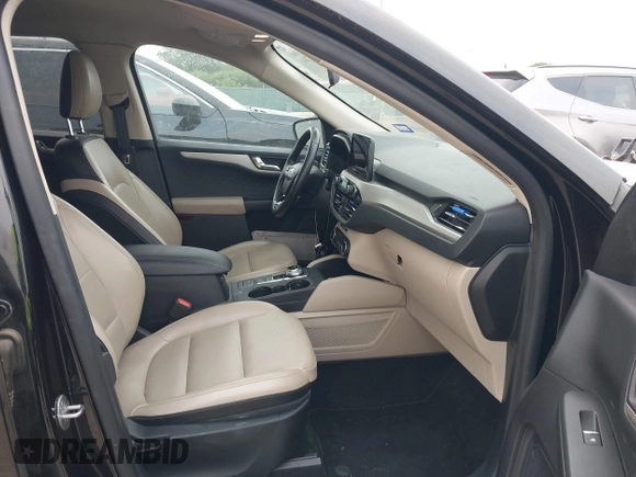 2020 Ford Escape SEL with VIN 1FMCU0H63LUA31648, listed as a IAAI auction lot 42295744 with 94,889 mi miles and . Bid and sale history available at DreamBid. Image 5.