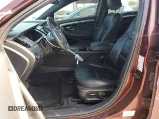 2015 Ford Taurus SEL with VIN 1FAHP2E96FG161735, listed as a Copart auction lot 61865294 with 148,070 mi miles and Salvage Title. Bid and sale history available at DreamBid. Image 7.