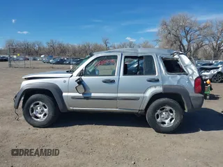 2004 Jeep Liberty Sport with VIN 1J4GL48K84W145318, listed as a IAAI auction lot 41885018 with 174,041 mi miles. Bid and sale history available at carsss.com. Image 13.