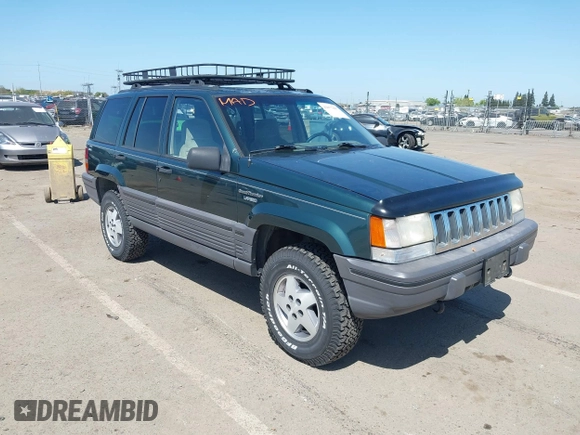 1995 Jeep Grand Cherokee Laredo with VIN 1J4GZ58Y2SC669152, listed as a IAAI auction lot 42077067 with 134,022 mi miles. Bid and sale history available at carsss.com. Image 1.