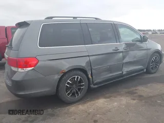 2008 Honda Odyssey Touring with VIN 5FNRL38888B018625, listed as a IAAI auction lot 41383235 with 215,255 mi miles. Bid and sale history available at carsss.com. Image 4.