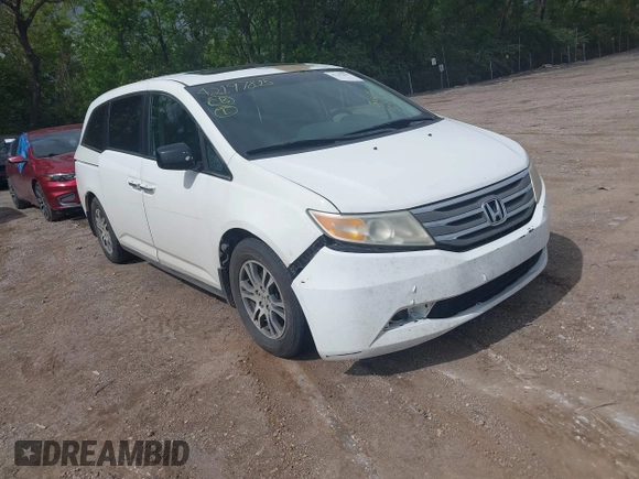 2012 Honda Odyssey EX-L with VIN 5FNRL5H63CB117341, listed as a IAAI auction lot 42197815 with 256,544 mi miles and . Bid and sale history available at DreamBid. Image 1.
