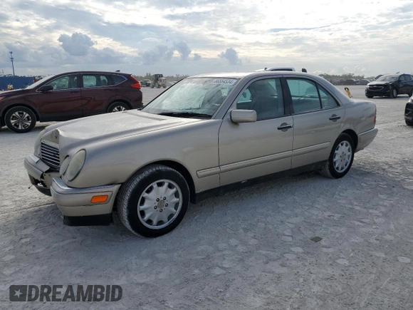 1999 Mercedes-Benz E-Class with VIN WDBJF82H9XX022535, listed as a Copart auction lot 86554534 with 140,904 mi miles and Salvage Title. Bid and sale history available at carsss.com. Image 1.