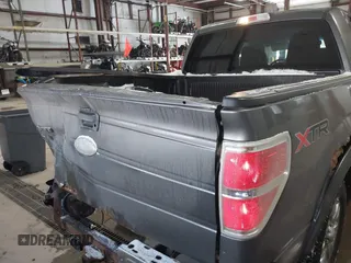 2011 Ford F-150 XLT with VIN 1FTFW1ET4BFB50467, listed as a IAAI auction lot 41608114 with 201,858 mi miles. Bid and sale history available at carsss.com. Image 16.