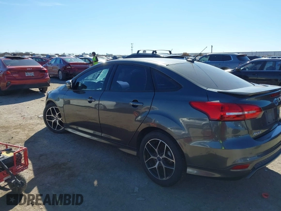 2016 Ford Focus SE with VIN 1FADP3F21GL262907, listed as a IAAI auction lot 41657582 with 62,789 mi miles. Bid and sale history available at carsss.com. Image 3.