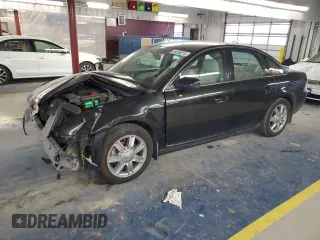 2009 Mercury Sable Premier with VIN 1MEHM42W79G614482, listed as a Copart auction lot 84599214 with 148,684 mi miles and Salvage Title. Bid and sale history available at carsss.com. Image 1.