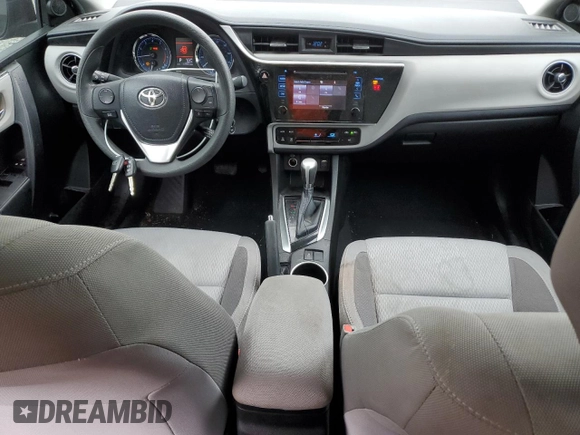 2019 Toyota Corolla L z VIN 5YFBURHE6KP870832, wystawiony jako Copart lot #57884205 z przebiegiem 132 860 mil mil oraz Szkoda całkowita • Salvage title. Historia ofert i sprzedaży dostępna na DreamBid. Obrazek 8.